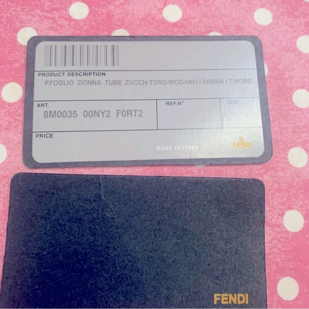 FENDI wallet  the iconic Fendi "FF" Zucca logo pattern on the canvas exterior. - Picture 4 of 4